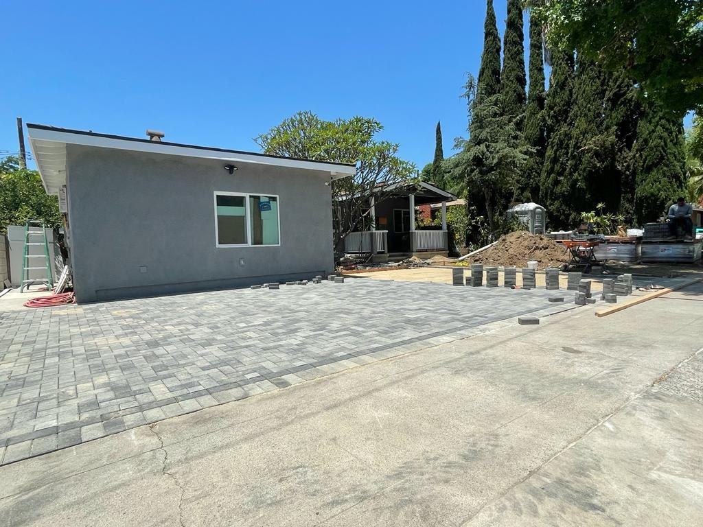 After: Finished grey paver driveway